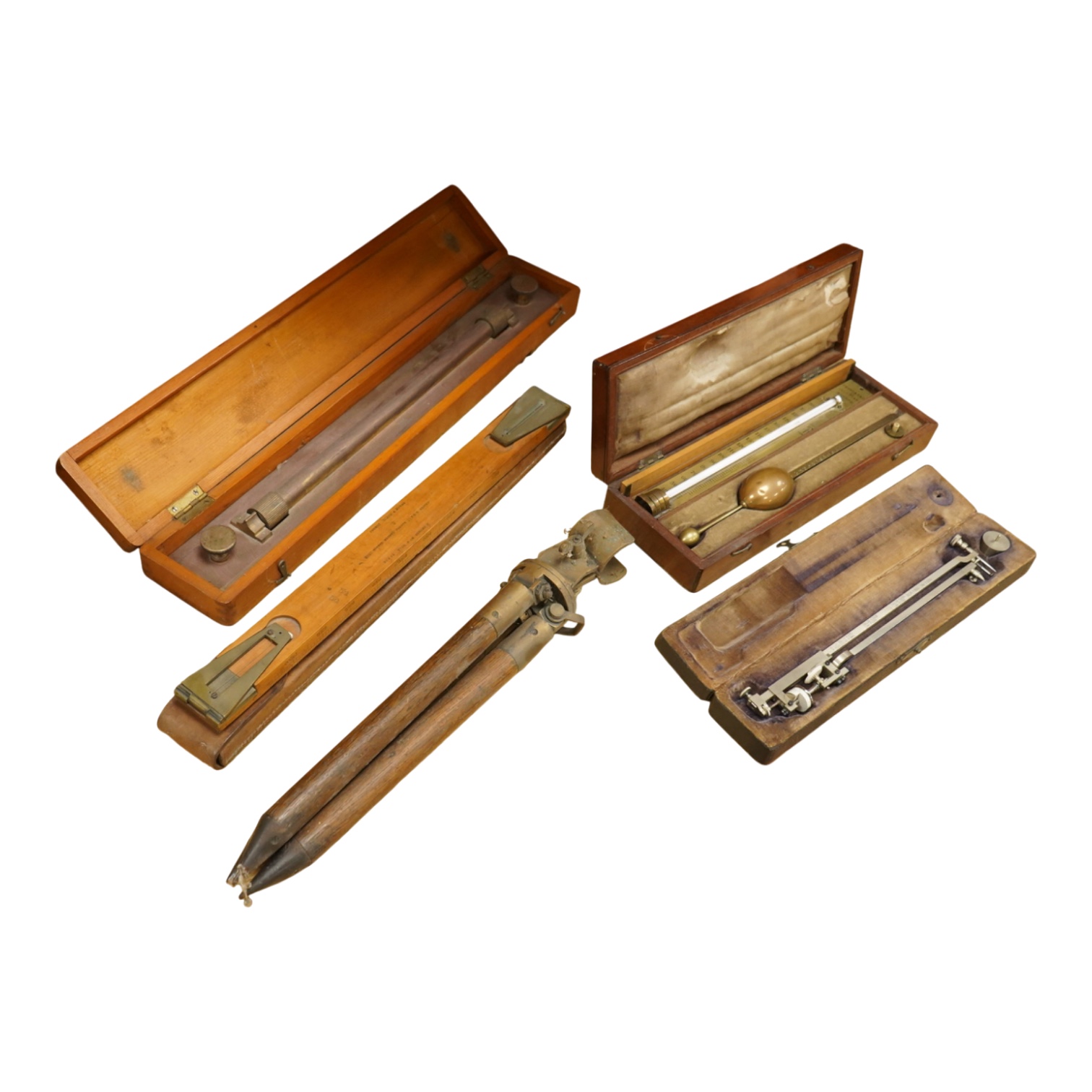 Five scientific instruments, comprising; a rolling parallel rule, pine boxed, 48cm wide; an early 20th century boxwood and brass Alidade, by J. Hicks, 8, 9 & 10, Hatton Garden, leather cased; an oak and brass tripod, sta